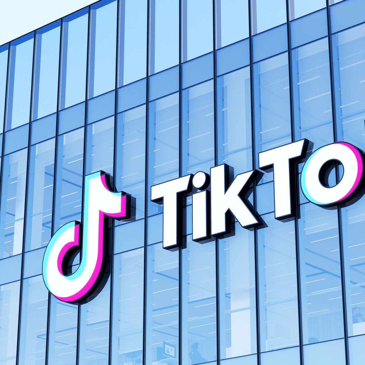 An image of an office building branded with the TikTok logo